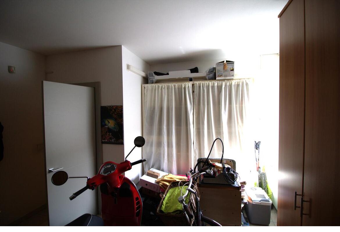 PORZIONE DI BIFAMILIARE ANGOLARE CON GARAGE E GIARDINO