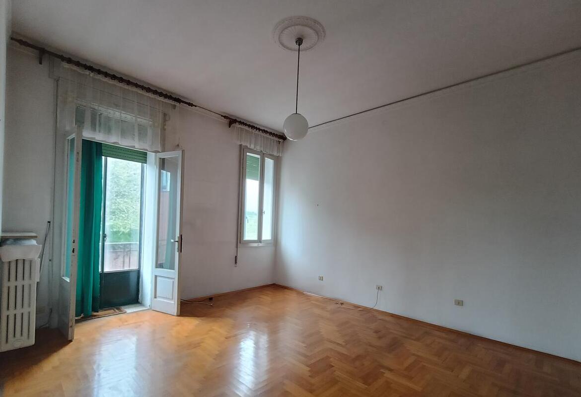 APPARTAMENTO TRILOCALE CON GRAZIOSA TAVERNA E CORTILETTO