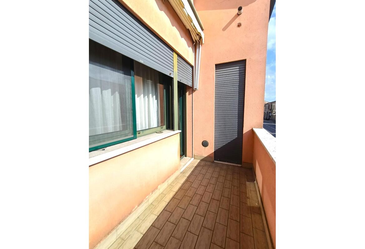 GRAZIOSO TRILOCALE CON GARAGE IN ZONA CENTRALE